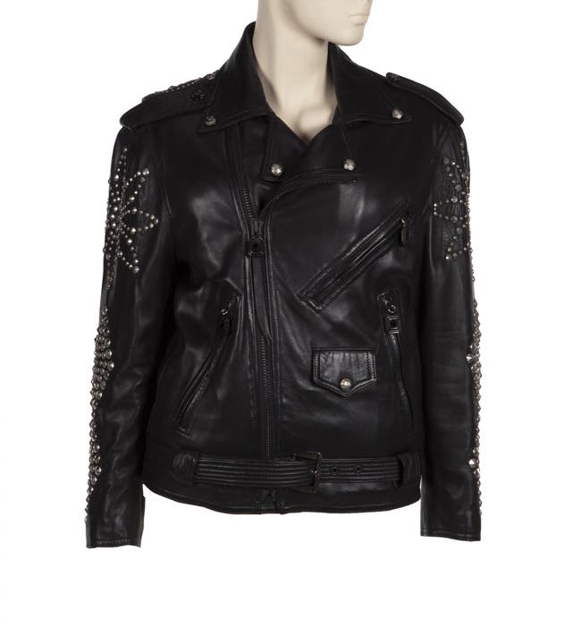 A beaded leather biker jacket designed by Versace and worn by Elizabeth Taylor during an appearance on the <i>Johnny Carson Show</i>. Pre-sale estimate: $4,000