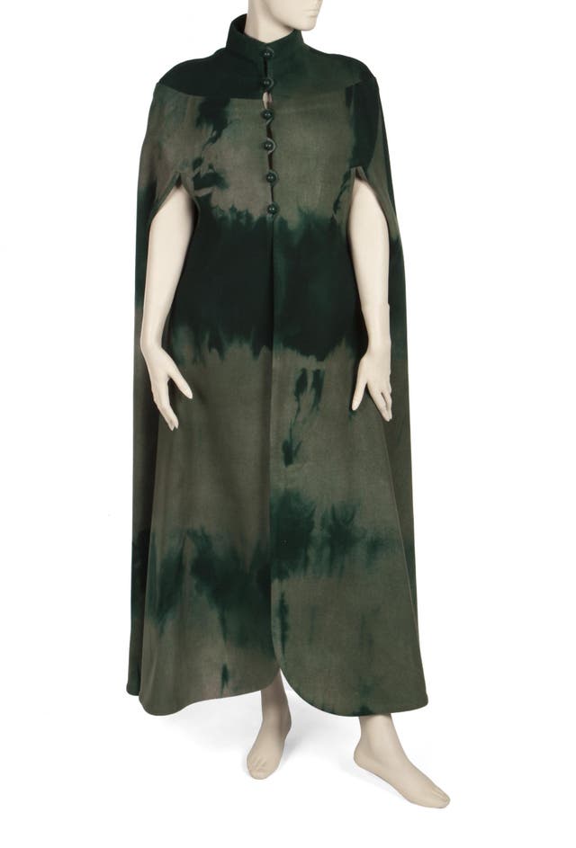 A green and black large heavy wool-felt blend tye-dye cape designed by Franca (Baroness Stael von Holstein) and worn by Elizabeth Taylor to Richard Burton's investiture. Pre-sale estimate: $6,000