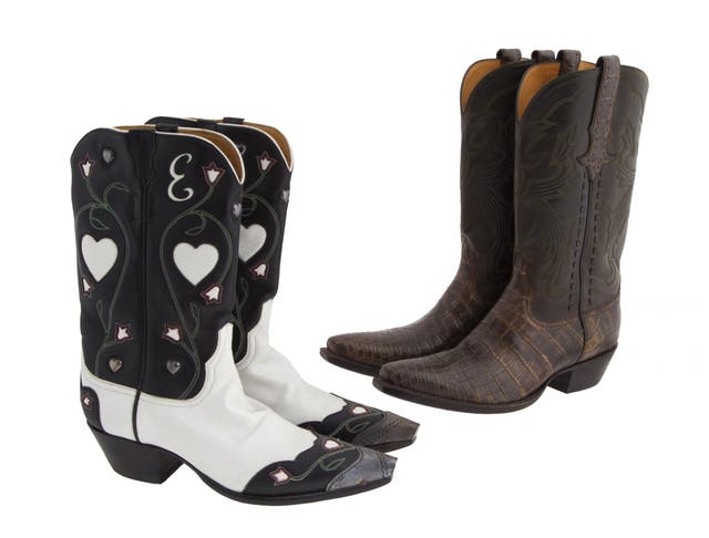 Two pairs Stallion brand cowboy boots: 1 pair of black and white leather, with vine, flower, and heart design, monogrammed "E"; and 1 pair of brown Crocodile. Pre-sale estimate: $600