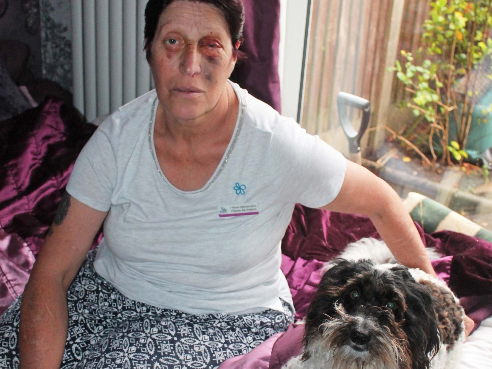 Joy Watson at home with her labradoodle Demi