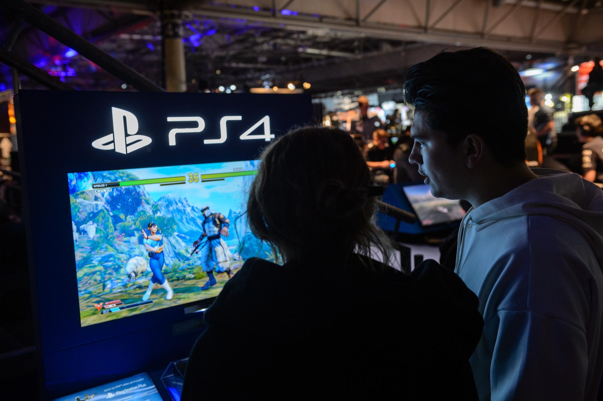 Participants play with the game console PS4 a video games at the 2018 DreamHack video gaming festival on January 27, 2018 in Leipzig, Germany