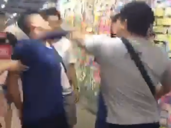 Pro-democracy campaigner repeatedly punched in face