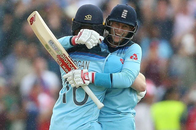 England's Eoin Morgan and Joe Root celebrate victory against Australia