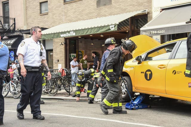A taxi injured eight when it drove into a restaurant in Manhattan (Rex)