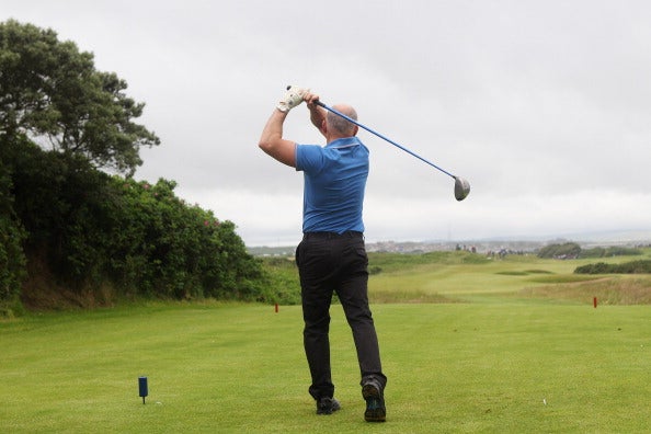 Barry McGuigan tees off during the Irish Open pro-am in 2012