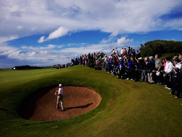 Rory McIlroy hits out of the bunker at Portrush