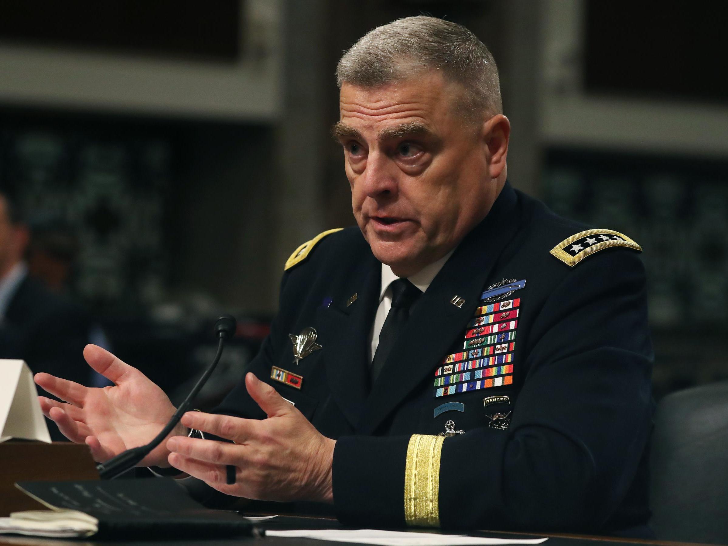 Trump's nominee for top US military officer pledges not to unduly defer to president's wishes