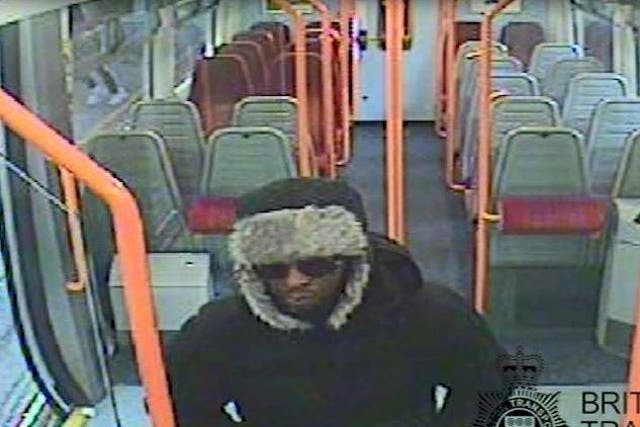 Darren Pencille seen on CCTV boarding a London-bound train at Guildford, shortly before murdering Lee Pomeroy