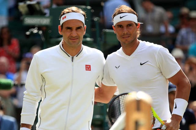 Roger Federer and Rafael Nadal pose before their match
