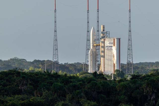 A rocket lifts off carrying satellites from the European Space Center in French Guiana