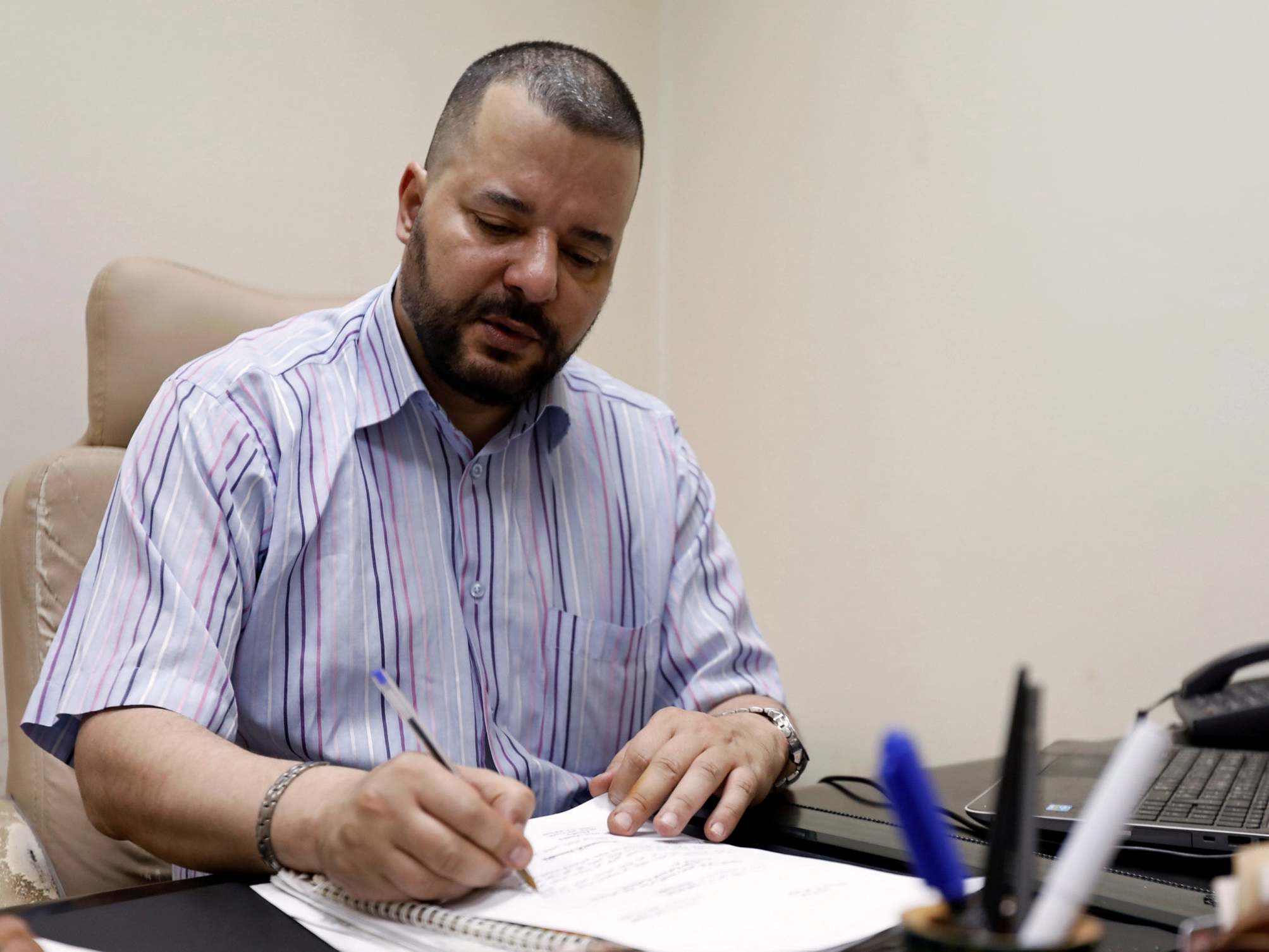 Tunisian LGBT+ activist and presidential candidate Mounir Baatour at his office in Tunis