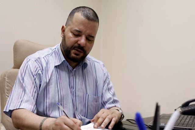 Tunisian LGBT+ activist and presidential candidate Mounir Baatour at his office in Tunis