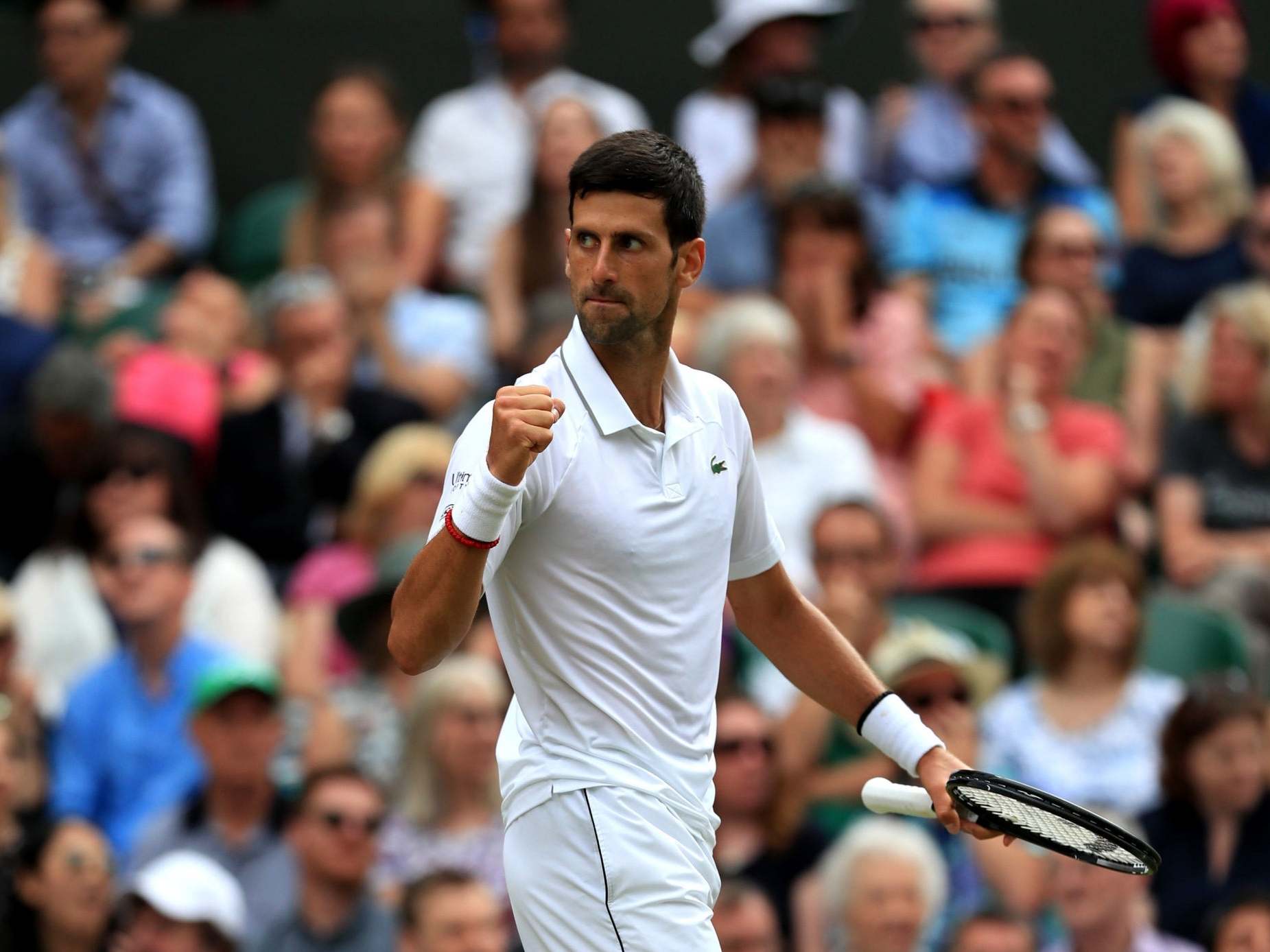 Djokovic celebrates clinching the first set