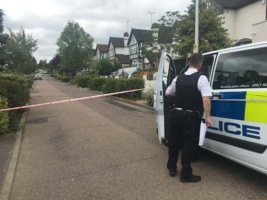 Police in Malvern Drive, Woodford Green, northeast London, where 41-year-old Paul Allen was shot