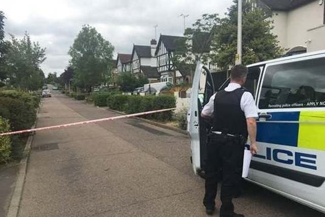 Police in Malvern Drive, Woodford Green, northeast London, where 41-year-old Paul Allen was shot