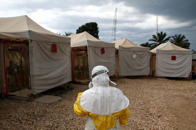 File image of health worker wearing Ebola protection gear in Democratic Republic of Congo.