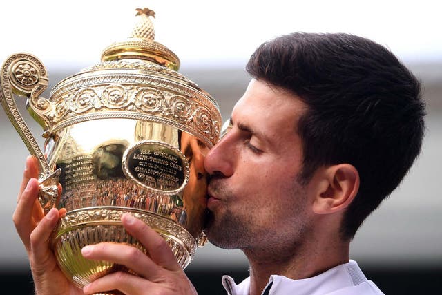 Djokovic kisses the trophy
