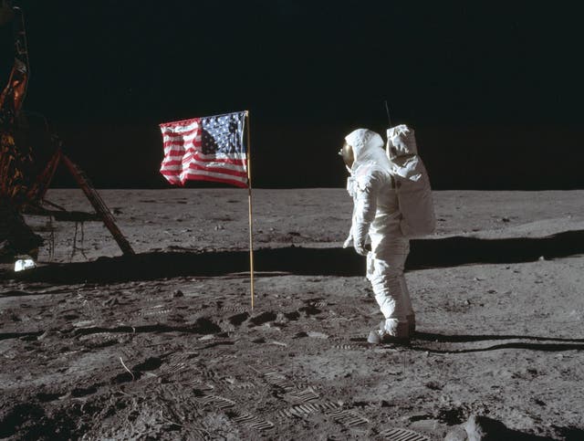 In this July 20, 1969 photo made available by NASA, astronaut Buzz Aldrin Jr. poses for a photograph beside the U.S. flag on the moon during the Apollo 11 mission