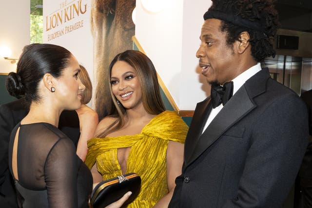 Meghan, Duchess of Sussex (L) meets cast and crew, including Beyonce Knowles-Carter (C) Jay-Z (R) as she attends the European Premiere of Disney's "The Lion King" at Odeon Luxe Leicester Square on July 14, 2019 in London, England.