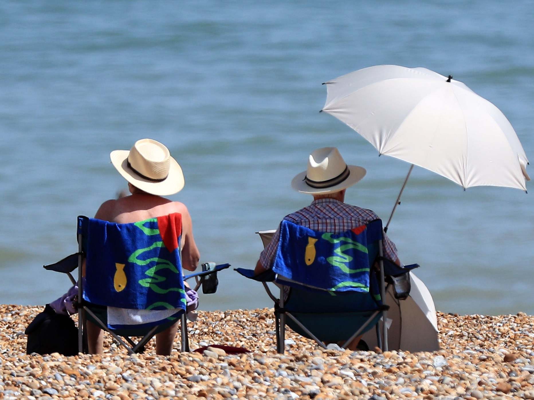 People enjoy the warm weather on the beach in Eastbourne Sussex