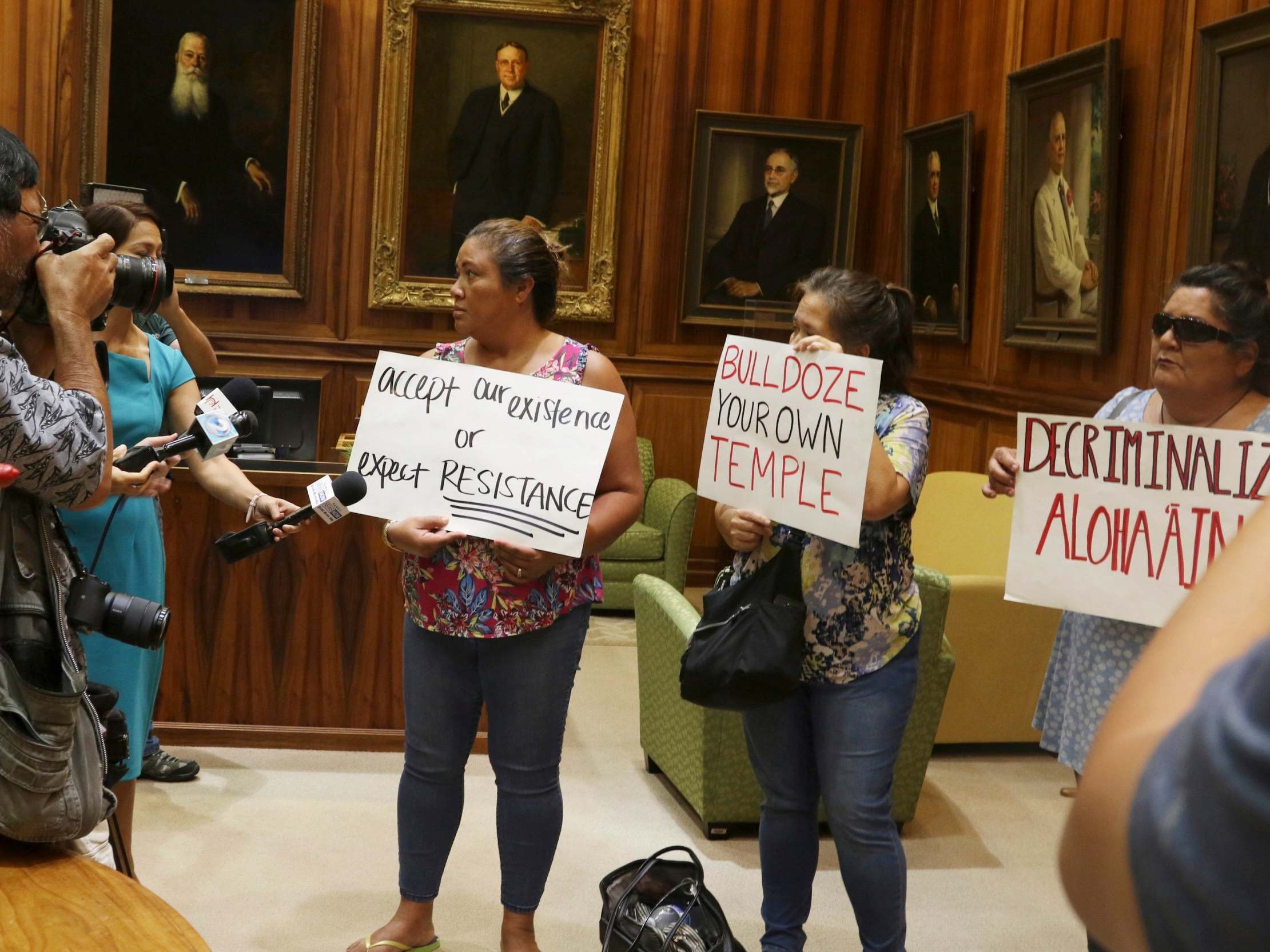 Protesters outside a news conference about the construction of the telescope, 10 July 2019