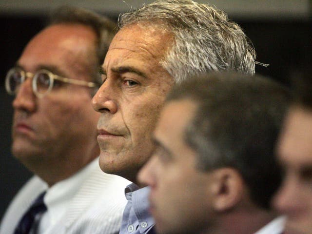 In this 30 July 2008, file photo, Jeffrey Epstein, centre, appears in court in West Palm Beach, Florida