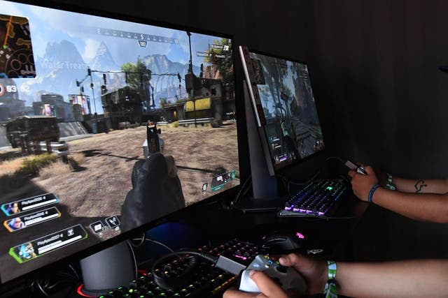 Gamers play a new version of Apex Legends video game at the EA PLAY event in California on 8 June, 2019