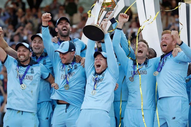 England captain Eoin Morgan raises the trophy after winning Cricket World Cup