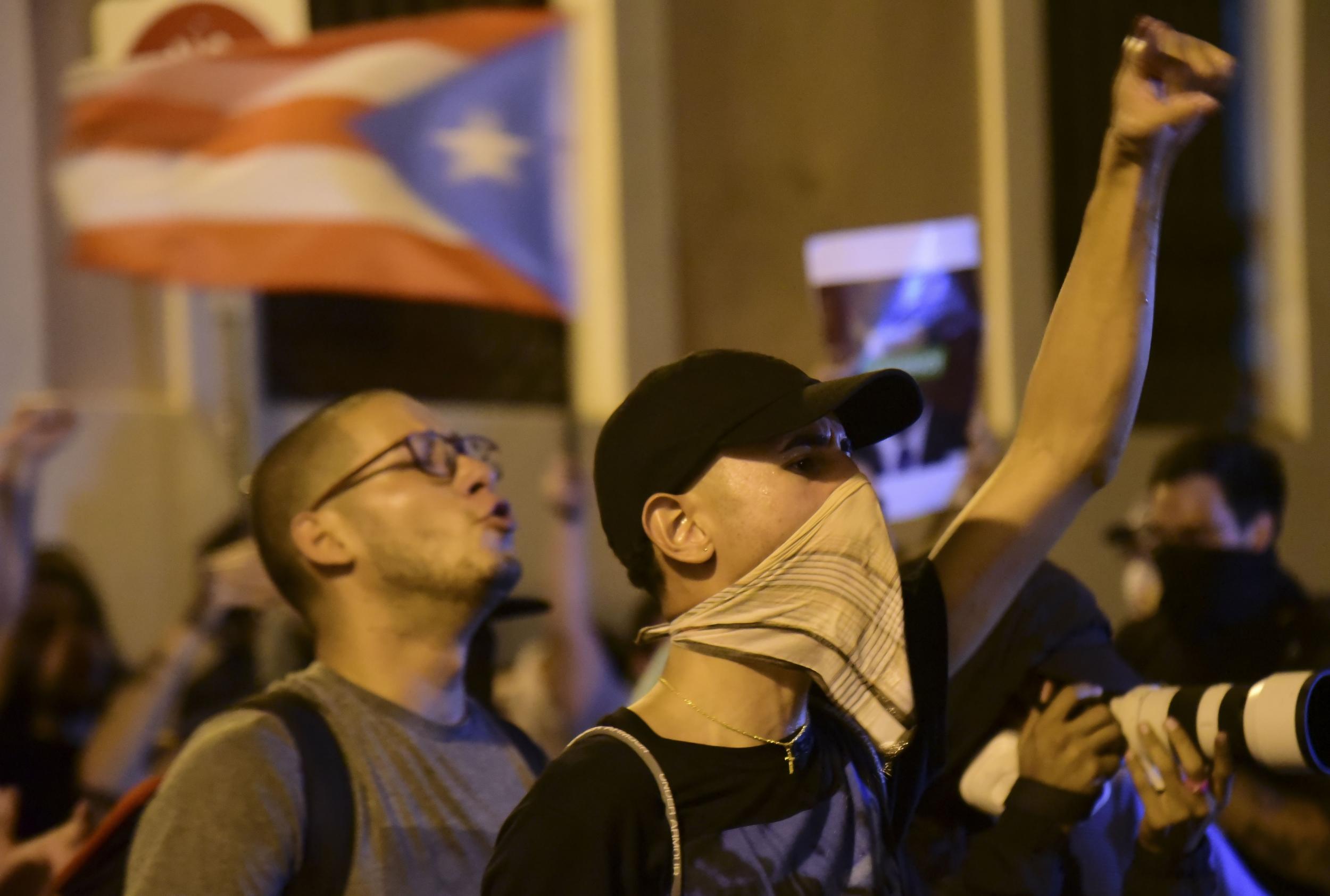 Puerto Ricans take to the streets as leaked chats among top officials show dysfunction amid Hurricane María