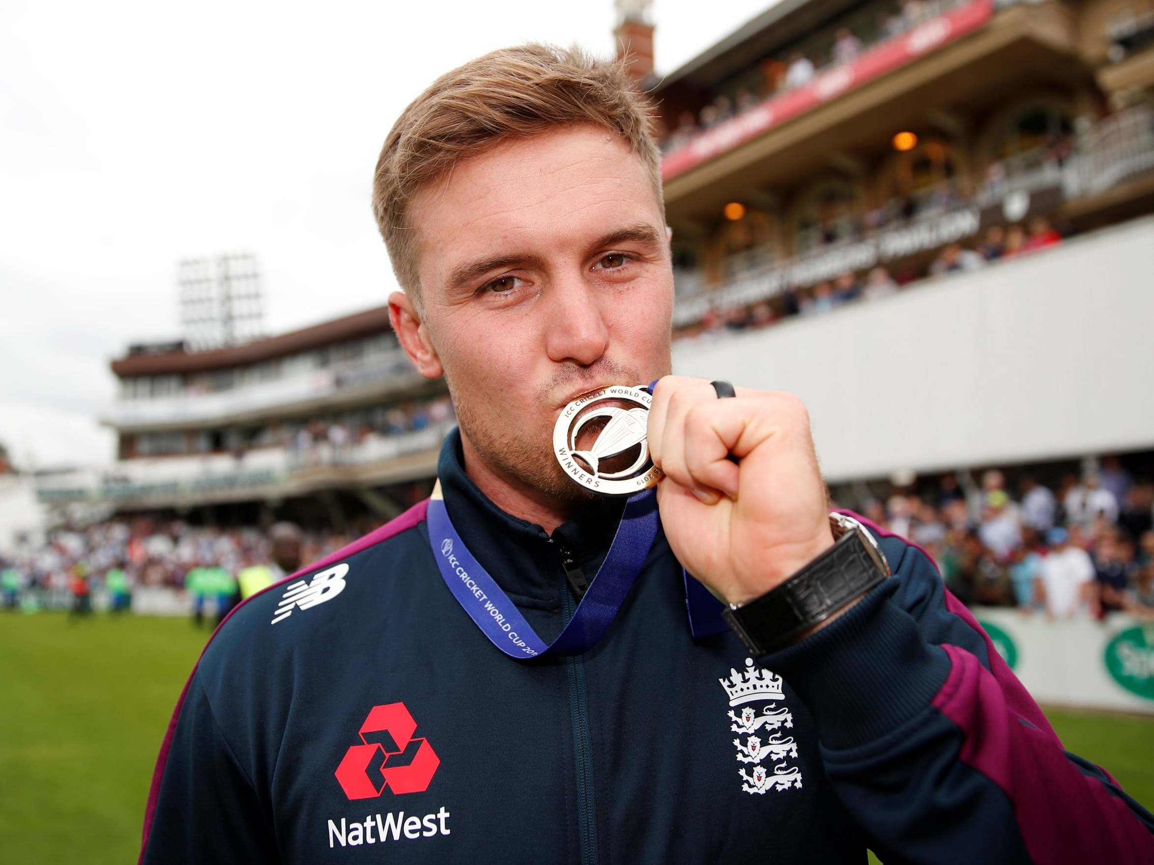 Jason Roy kisses his World Cup medal
