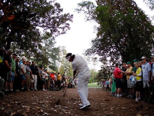 Bubba Watson hooks out of pine straw at Augusta in the Masters play-off