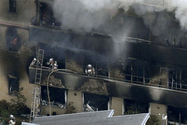 Firefighters battle a fire at the Kyoto Animation Company studio building in Japan on 18 July 2019