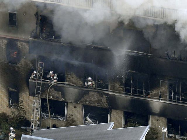 Firefighters battle a fire at the Kyoto Animation Company studio building in Japan on 18 July 2019