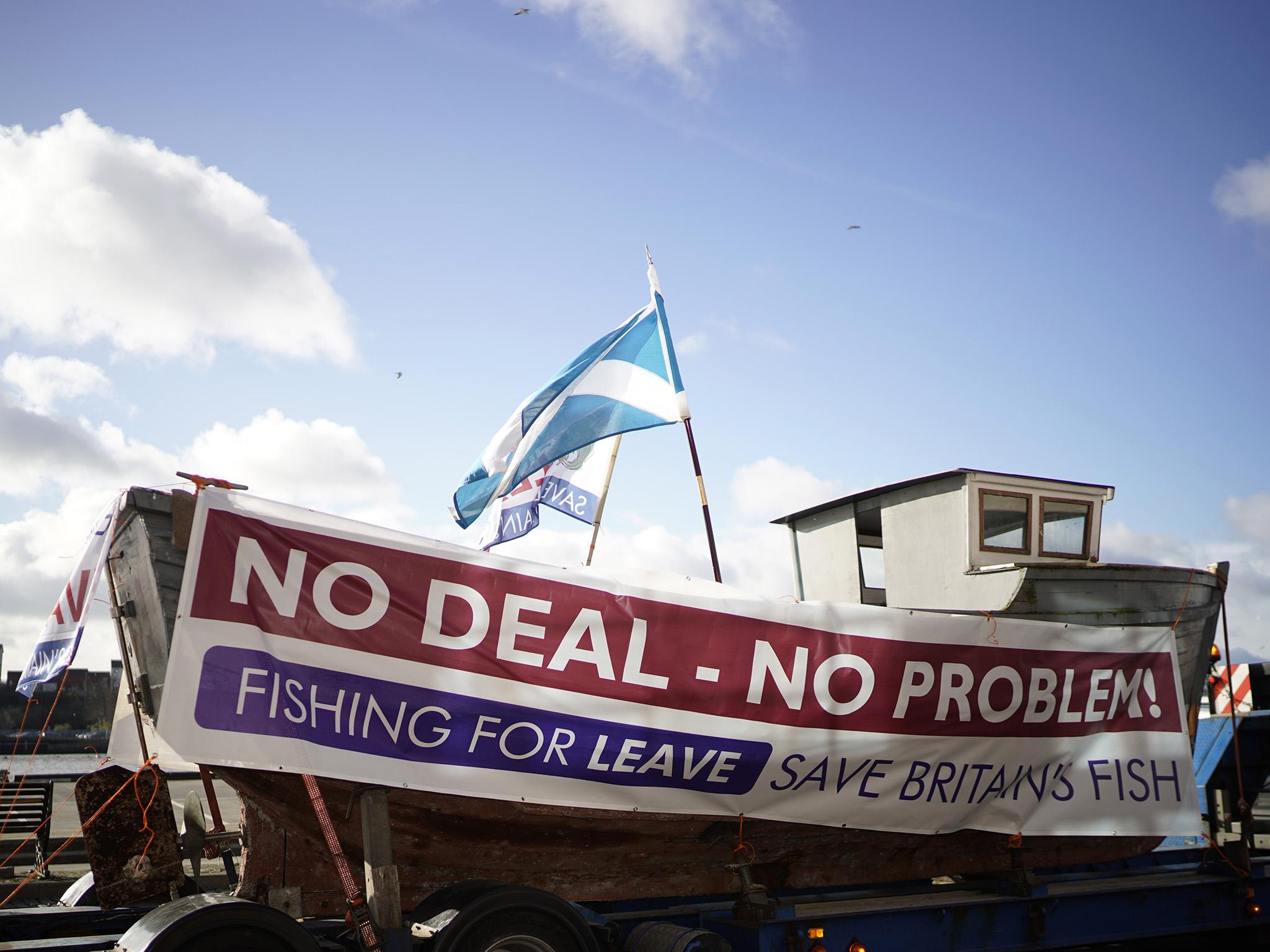 A boat in North Shields is adorned with slogans ahead of the Fishing for Leave flotilla in March (Getty)