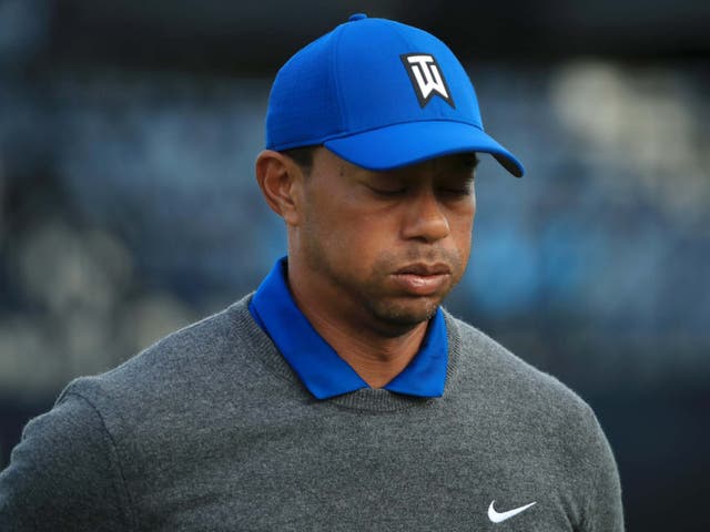 Tiger Woods suffered with a sore back throughout his first round at The Open