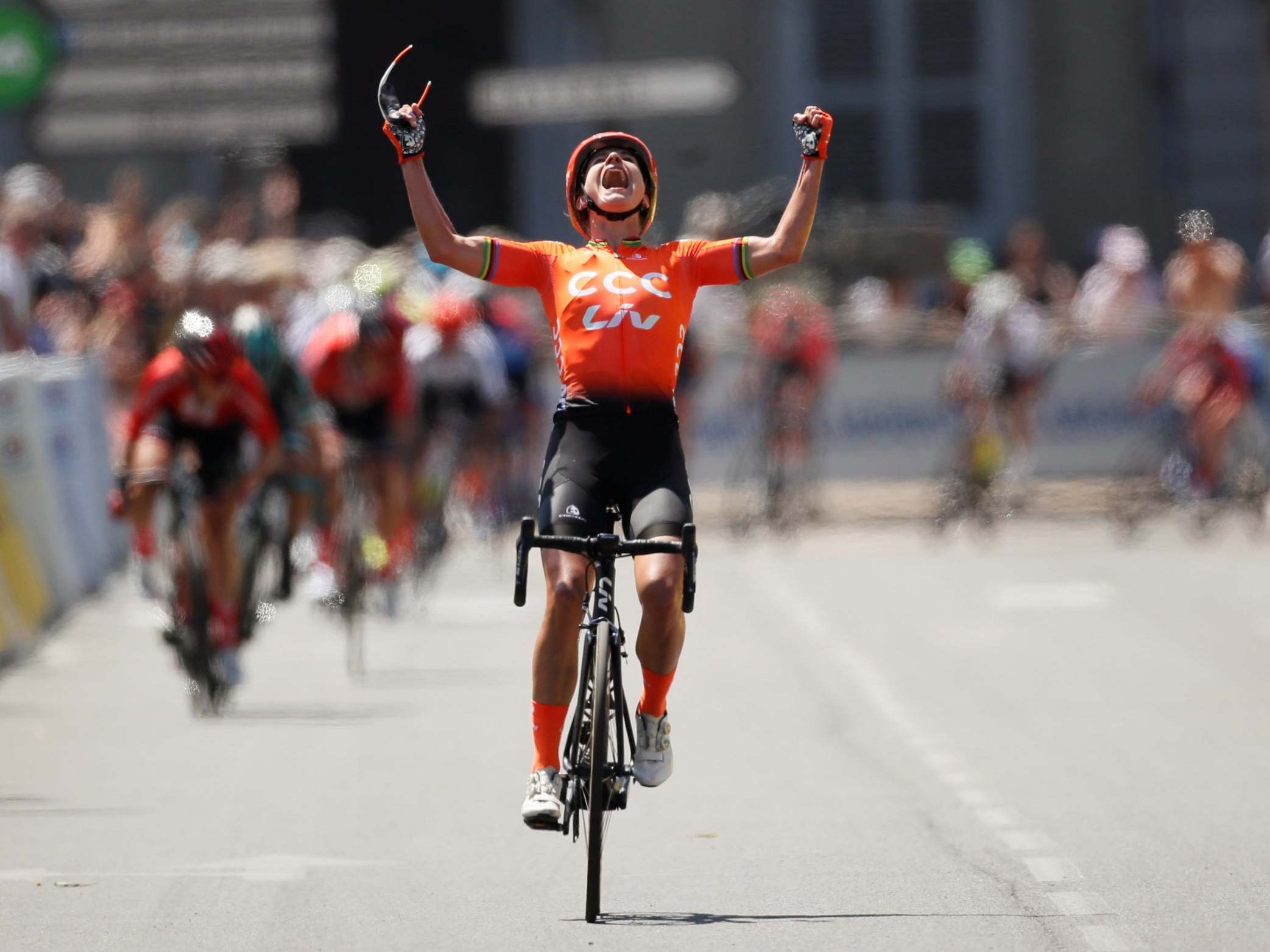 Marianne Vos celebrates as she crosses the finish line
