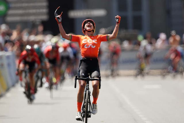 Marianne Vos celebrates as she crosses the finish line