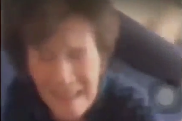 A still from the shocking video which allegedly depicts a home healthcare aide abusing an elderly patient.