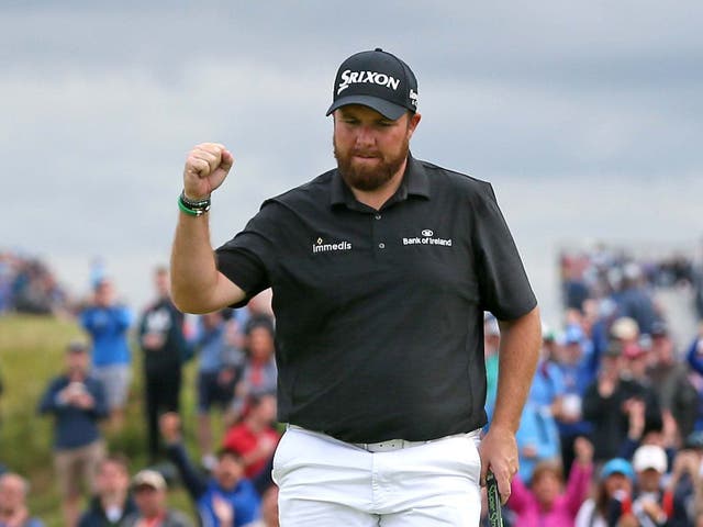 Shane Lowry celebrates a birdie at the 15th