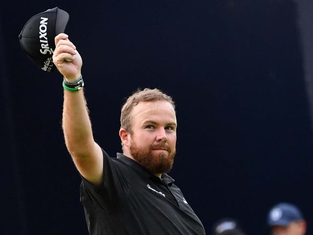 Shane Lowry celebrates his course record after an eight-under par 63