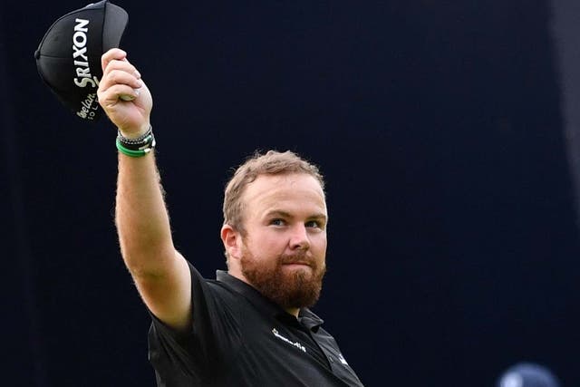 Shane Lowry celebrates his course record after an eight-under par 63