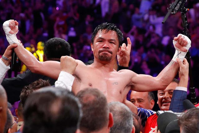 Pacquiao celebrates his victory over Thurman
