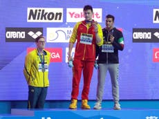 Swimmer refuses to join 'drug cheat' Chinese winner on podium