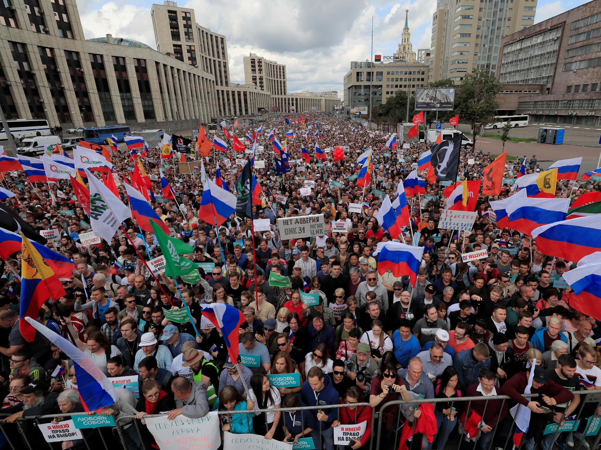 People take part in a rally in support of independent candidates for elections to Moscow's regional parliament, in Moscow, Russia on 20 July 2019.