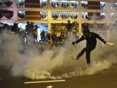 Hong Kong police launch tear gas at protesters at democracy march