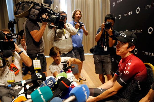 Geraint Thomas faces the media on the second rest day