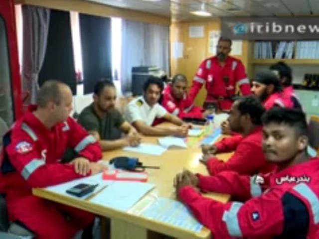 Crew members of the British-flagged tanker Stena Impero seen in an image released by Iranian state media