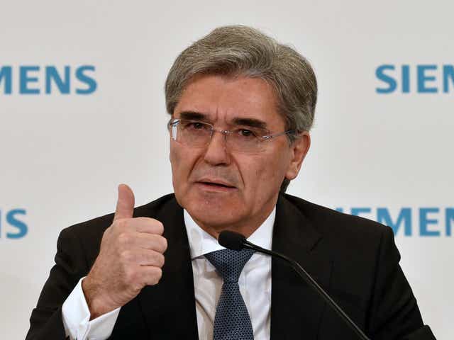 Siemens boss Joe Kaeser is closely tied to German Chancellor Angela Merkel, both of whom have condemned Trump's racist comments