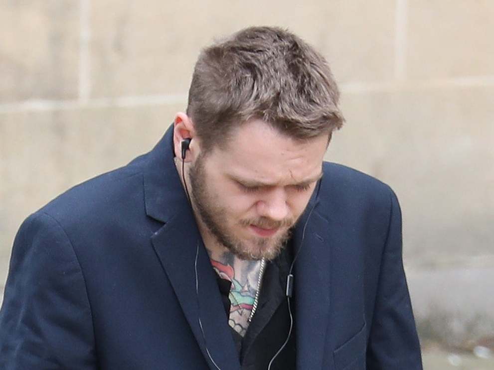 Two men have been charged with an attack on Richard Elmes