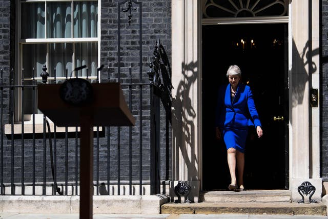 Britain’s former PM at 10 Downing Street in 2019, before tendering her resignation at Buckingham Palace